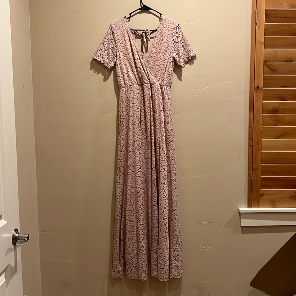 Blush maxi lace dress, great for a spring or summer wedding! Fun bow detail